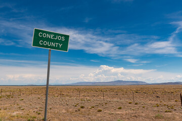 A Conejos County sign along US highway 285, in the State of Colorado, USA