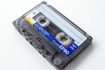 Audio cassette, on isolated white background.
