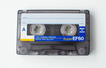 Audio cassette, on isolated white background.
