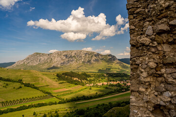 Beautiful view of Piatra Secuiului from the Trascaului Mountains seen from inside the fortress of Trascaului, a tourist settlement in Romania with beautiful hiking trails.