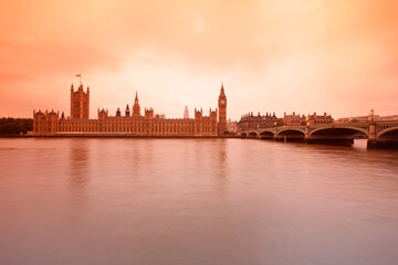 Fototapeta na wymiar Palace of Westminster at sunset, viewed from across the river Thames, London, UK