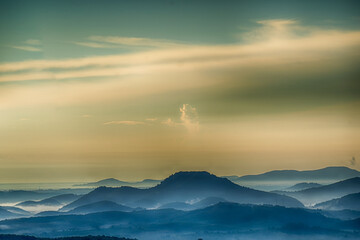 Morning in the mountains. Fog covering the mountain forests.