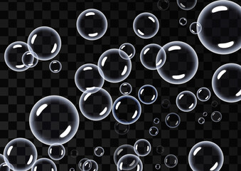 Round transparent clean realistic soap bubbles on a transparent abstract background. Vector