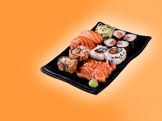 close up of japanese food on orange background