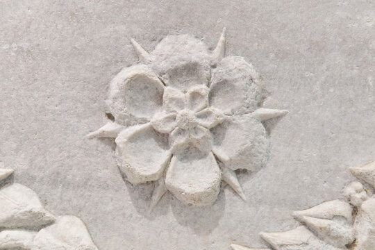 fragment of a flower pattern on an antique marble ancient Greek altar of the 4th-3rd c. BC. from Chersonesos, Crimea