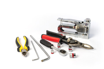 Tools for construction and household repairs on a white background.