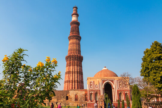 Qutub Minar a highest minaret in India standing 73 m tall tapering tower of five storeys made of red sandstone. It is UNESCO world heritage site at New Delhi, India