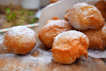 Doughnuts Beignet with sugar powder and jam on the wooden table