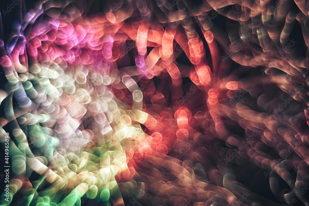 Aufkleber Beautiful optical abstract multicoloured  bokeh in the darkness  background.