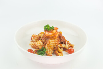Pasta Fettuccine Bolognese with tomato sauce and prawns and squid in white plate on white background