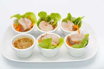 Spicy salad Shrimp in fish sauce and herb and Spicy Sauce Seafood dipping chili hot and spicy dish on White Background