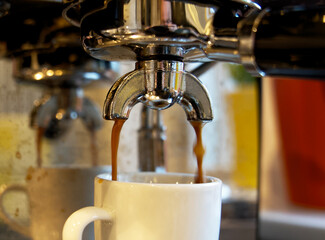 Close up of brewing a fresh espresso with a piston machine