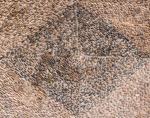 Floor made out of natural and tiled Stones