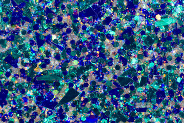 Irregular Glitter Shapes in Shades of Blue and Green Abstract Background