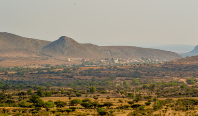landscape with mountains and little town