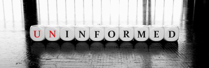 banner with words uninformed or informed