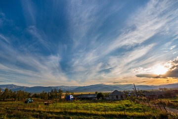 Amazing sunset landscape with village houses, Armenia