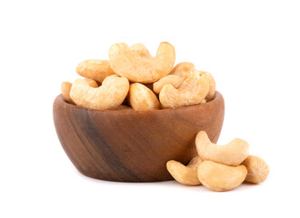 Cashew nuts in wooden bowl, isolated on white background. Roasted cashew nuts.