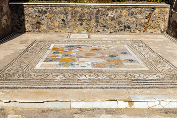 Tiled floor and mosaic in Pompeii, Italy
