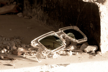 Pixel sunglasses model shoot in a urban place closeup in a sunny day. Selective focus. High quality photo