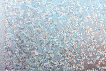 a winter window covered by frost