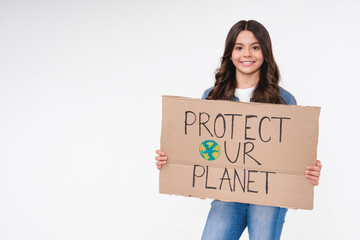 Smiling eco-friendly teenage girl holding a poster with save the planet concept isolated in white background