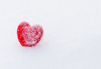 Red heart in the snow..