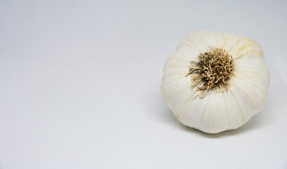 ripe garlic on a white background. Organic garlic from the local farmers market.