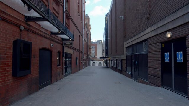 Smooth stabilised shot tracking down empty central London street during Covid-19 Lockdown