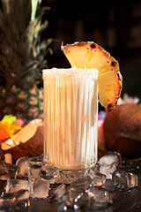 alcoholic cocktail Pina colada on the background of fruit