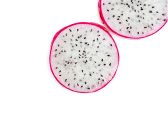 Two slices of dragon fruit with white flesh on a white background. The pink-skinned pitaya fruit is low in calories, rich in essential vitamins and minerals, and contains dietary fiber.
