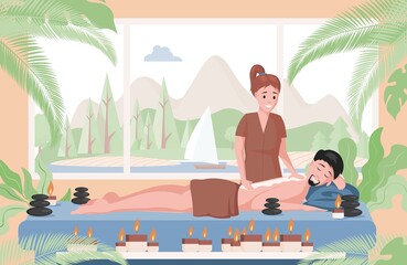 Obraz premium Massage therapist practicing massage on lying man. Relaxed man lying on couch and enjoying body massage. Spa salon or resort, wellness center, body relaxing treatment concept.
