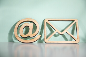 wooden envelope letter and e mail symbols