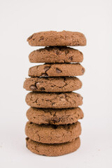 chocolate chip cookies with chocolate pieces on white background