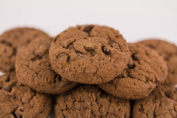 chocolate chip cookies with chocolate pieces on white background