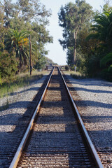 Fototapeta premium Southern California railroad tracks of a line along the coast near the town of Carpinteria