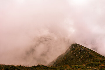 At the top of the mountain Gutyn Tomnatyk, the view from the mountain on the Montenegrin overcast ridge, breathtaking landscapes, enchant with their grandeur.