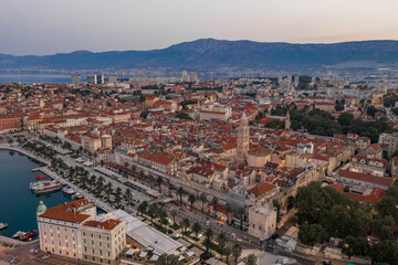 Aerial drone shot of Diocletian Palace in old town split with empty riva street befor sunrise in morning in Croatia