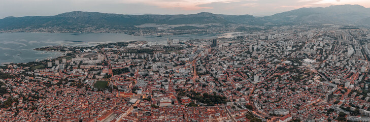 Fototapeta na wymiar Aerial panoramic drone view of Split new town before sunrise in morning in Croatia