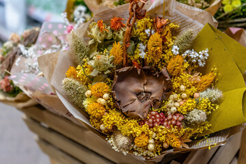 Bouquet of preserved flowers in yellow tones for Valentine's Day on February 14 or International Women's Day on March 8