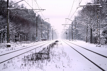 Two track tracks covered with snow for the train.