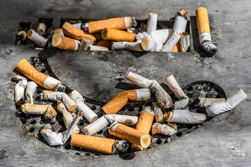 cigarette end in public sculpture 