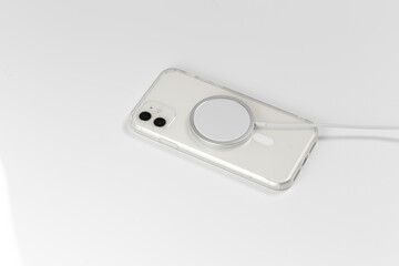wireless magnetic charger for your phone. white background