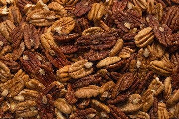 Tasty pecan-nut background. Top view.