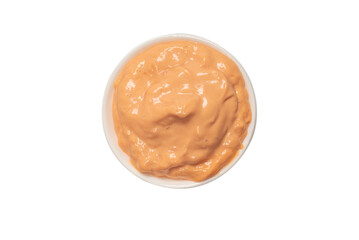 Sauce in a bowl isolated on white.