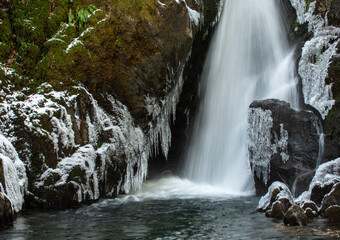 frozen waterfall in the forest
