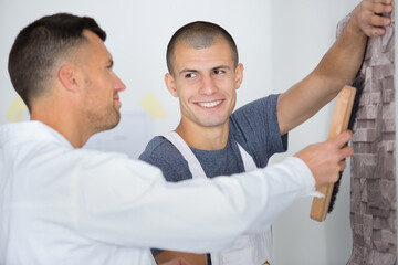 Obraz premium commercial painter having funny conversation