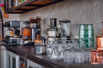 Bar counter background with coffee machine and glasses