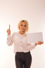 Girl holding blank space for lettering and logo.