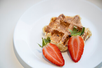 breakfast waffles with fragrant strawberries